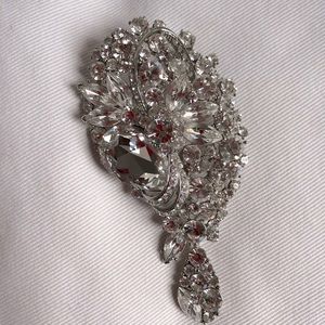 Silver rhinestone brooch